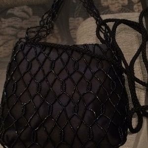 Small black satin beaded evening bag